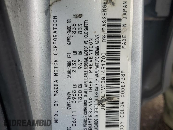 2011 Mazda 3 i Touring with VIN JM1BL1VF3B1491700, listed as a Copart auction lot 61573885 with 145,626 mi miles and Salvage title. Bid and sale history available at DreamBid. Image 12.