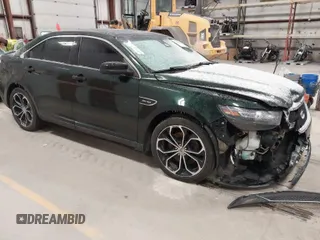 2013 Ford Taurus SHO z VIN 1FAHP2KT8DG142620, wystawiony jako IAAI lot #41800583 z przebiegiem 175 812 mil mil oraz . Historia ofert i sprzedaży dostępna na DreamBid. Obrazek 1.