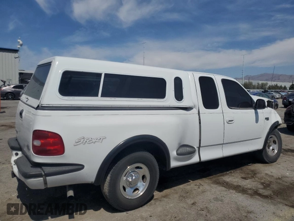 1999 Ford F-150 XL with VIN 1FTZX0726XKA98752, listed as a Copart auction lot 58986695 with Not provided miles and Salvage title. Bid and sale history available at DreamBid. Image 3.