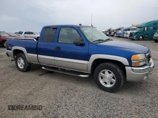 2004 GMC Sierra 1500 SLE with VIN 1GTEK19T34Z267816, listed as a Copart auction lot 54185515 with 214,695 mi miles and Salvage title. Bid and sale history available at DreamBid. Image 4.