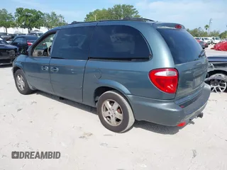 2005 Dodge Caravan SXT with VIN 2D8GP44L55R130702, listed as a IAAI auction lot 42090867 with 232,655 mi miles and . Bid and sale history available at carsss.com. Image 3.