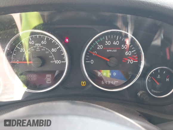 2017 Jeep Wrangler Unlimited Rubicon Recon with VIN 1C4BJWFG1HL693572, listed as a IAAI auction lot 42601855 with 64,342 mi miles and . Bid and sale history available at DreamBid. Image 7.