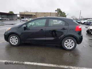 2013 Kia Rio LX with VIN KNADM5A35D6302623, listed as a IAAI auction lot 41626083 with 114,132 mi miles. Bid and sale history available at carsss.com. Image 14.