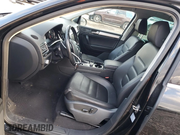 2012 Volkswagen Touareg Sport z VIN WVGEF9BP7CD006020, wystawiony jako Copart lot #88211145 z przebiegiem 180 729 mil mil oraz Szkoda całkowita • Salvage title. Historia ofert i sprzedaży dostępna na DreamBid. Obrazek 7.