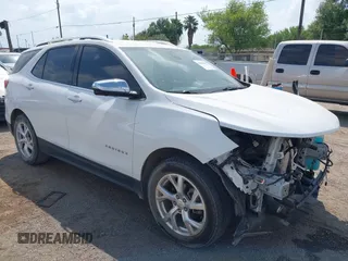 2019 Chevrolet Equinox Premier z VIN 2GNAXNEV6K6238163, wystawiony jako IAAI lot #41861295 z przebiegiem 79 534 mil mil oraz . Historia ofert i sprzedaży dostępna na DreamBid. Obrazek 1.