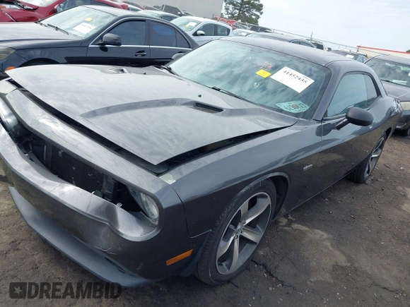 2014 Dodge Challenger R/T z VIN 2C3CDYBT7EH293104, wystawiony jako IAAI lot #41452435 z przebiegiem 49 728 mil mil oraz . Historia ofert i sprzedaży dostępna na DreamBid. Obrazek 17.