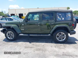 2022 Jeep Wrangler Unlimited Sahara z VIN 1C4HJXEN3NW242458, wystawiony jako IAAI lot #42352073 z przebiegiem 26 154 mil mil oraz . Historia ofert i sprzedaży dostępna na DreamBid. Obrazek 14.