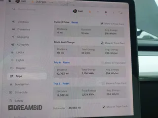 2019 Tesla Model 3 Mid Range with VIN 5YJ3E1EA8KF538083, listed as a IAAI auction lot 41891458 with 46,958 mi miles and . Bid and sale history available at carsss.com. Image 7.