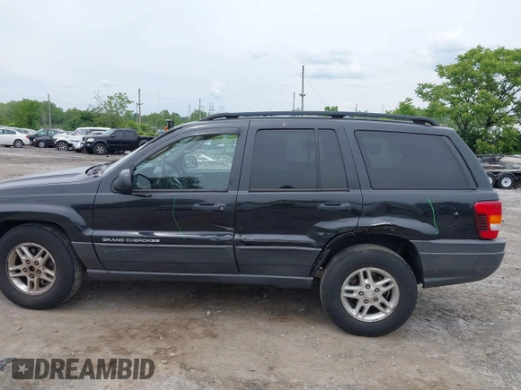2004 Jeep Grand Cherokee Laredo z VIN 1J4GW48S54C198115, wystawiony jako IAAI lot #42351240 z przebiegiem 189 416 mil mil oraz . Historia ofert i sprzedaży dostępna na DreamBid. Obrazek 6.