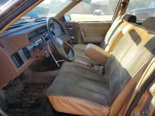 1985 Chevrolet Celebrity z VIN 2G1AW19R2F1120933, wystawiony jako Copart lot #75407474 z przebiegiem 78 007 mil mil oraz Szkody całkowita. Historia ofert i sprzedaży dostępna na DreamBid. Obrazek 7.
