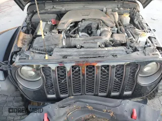 2020 Jeep Gladiator Rubicon z VIN 1C6JJTBG5LL101185, wystawiony jako Copart lot #83012014 z przebiegiem Nie podano mil oraz Nie do naprawy • Non repairable. Historia ofert i sprzedaży dostępna na DreamBid. Obrazek 12.