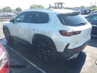 2024 Mazda CX-50 Premium Plus with VIN 7MMVABEY9RN207368, listed as a IAAI auction lot 42211942 with 13,940 mi miles and . Bid and sale history available at DreamBid. Image 3.