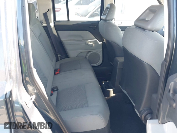 2007 Jeep Patriot Sport with VIN 1J8FF28W87D294692, listed as a IAAI auction lot 42236349 with 127,859 mi miles and . Bid and sale history available at DreamBid. Image 8.