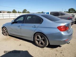 2015 BMW 3 Series 328i with VIN WBA3C1C55FK118931, listed as a Copart auction lot 64058985 with 171,332 mi miles and Salvage title. Bid and sale history available at DreamBid. Image 2.