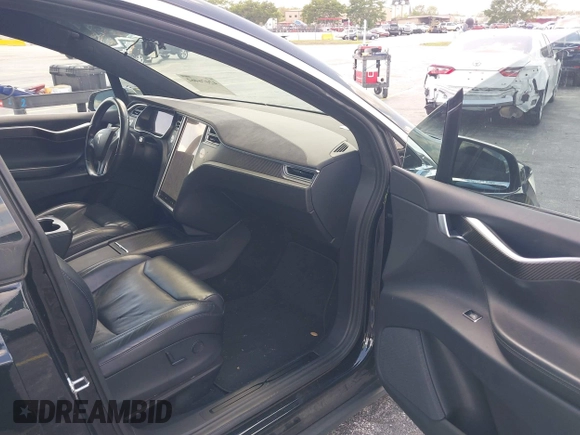 2017 Tesla Model X 90D with VIN 5YJXCBE21HF054898, listed as a IAAI auction lot 42076462 with 89,996 mi miles and . Bid and sale history available at DreamBid. Image 5.