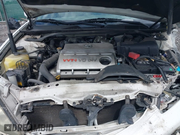 2005 Toyota Camry LE with VIN JTDBF30KX50165586, listed as a IAAI auction lot 41948322 with 84,326 mi miles and . Bid and sale history available at DreamBid. Image 10.