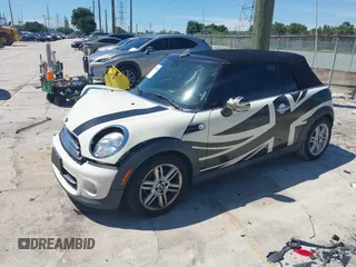 2015 MINI Convertible with VIN WMWZN3C53FT861968, listed as a IAAI auction lot 42717485 with 79,840 mi miles and . Bid and sale history available at DreamBid. Image 17.