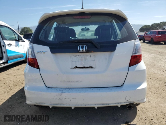 2012 Honda Fit Sport with VIN JHMGE8H50CC009958, listed as a Copart auction lot 55423075 with 117,618 mi miles and Salvage Title. Bid and sale history available at DreamBid. Image 6.