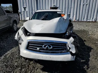 2014 Infiniti QX70 z VIN JN8CS1MU8EM450011, wystawiony jako Copart lot #47757235 z przebiegiem Nie podano mil oraz Szkoda całkowita • Salvage title. Historia ofert i sprzedaży dostępna na DreamBid. Obrazek 5.