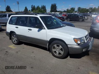 1999 Subaru Forester S with VIN JF1SF6557XH703160, listed as a Copart auction lot 60076974 with 0 mi miles and Salvage Title. Bid and sale history available at carsss.com. Image 4.