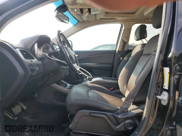 2015 Dodge Journey SXT with VIN 3C4PDCCG5FT559021, listed as a Copart auction lot 60101335 with 323,930 mi miles and Salvage title. Bid and sale history available at DreamBid. Image 7.