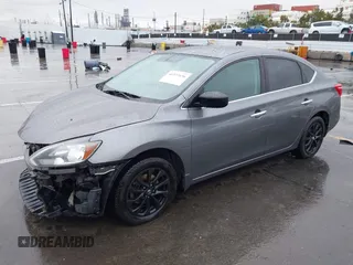 2018 Nissan Sentra S with VIN 3N1AB7AP0JY244535, listed as a IAAI auction lot 41573436 with 150,919 mi miles and . Bid and sale history available at DreamBid. Image 2.