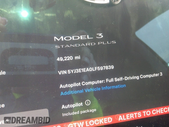 2020 Tesla Model 3 Standard Range Plus with VIN 5YJ3E1EA0LF597839, listed as a IAAI auction lot 41639219 with 49,220 mi miles. Bid and sale history available at carsss.com. Image 7.