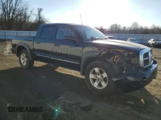 2005 Dodge Dakota SLT with VIN 1D7HE48KX5S183054, listed as a Copart auction lot 88529005 with 245,729 mi miles and Salvage Title. Bid and sale history available at DreamBid. Image 4.