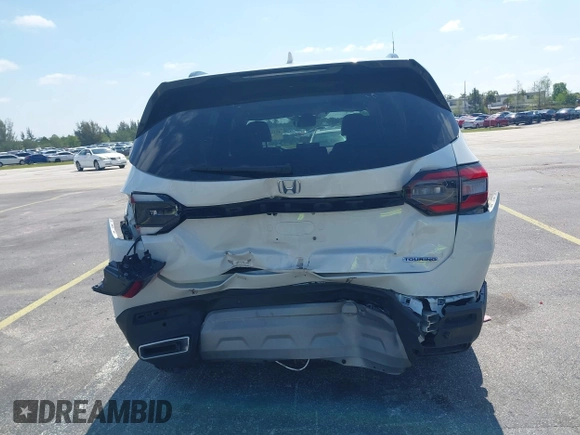 2024 Honda Pilot Touring z VIN 5FNYG2H72RB016937, wystawiony jako IAAI lot #42137854 z przebiegiem 18 028 mil mil oraz . Historia ofert i sprzedaży dostępna na DreamBid. Obrazek 16.