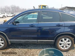 2009 Honda CR-V EX-L with VIN 5J6RE48759L010532, listed as a IAAI auction lot 41843362 with 112,651 mi miles. Bid and sale history available at carsss.com. Image 15.