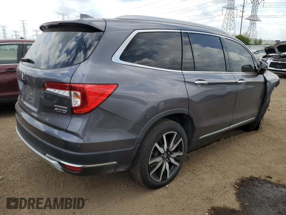 2022 Honda Pilot Touring 7-Passenger with VIN 5FNYF6H6XNB014347, listed as a Copart auction lot 56869745 with 31,513 mi miles and Salvage title. Bid and sale history available at DreamBid. Image 3.