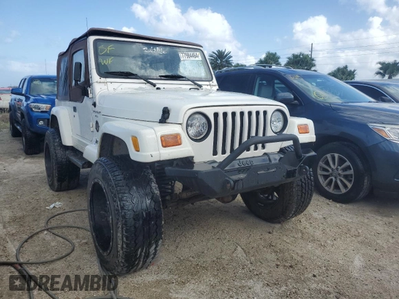 2001 Jeep Wrangler Sahara with VIN 1J4FA59S31P334308, listed as a Copart auction lot 77984464 with 116,293 mi miles and Salvage Title. Bid and sale history available at carsss.com. Image 4.