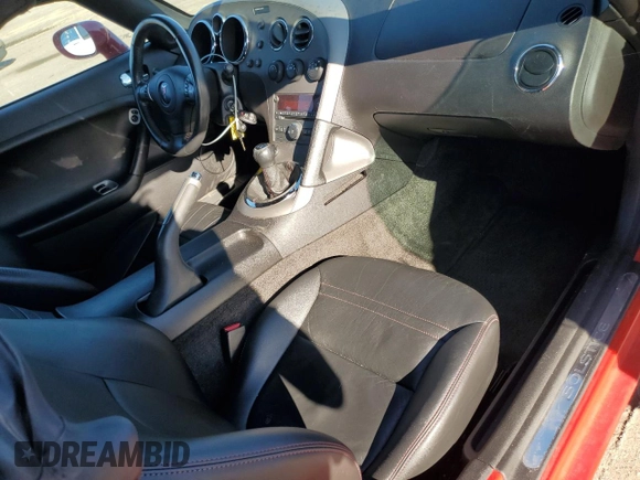 2007 Pontiac Solstice GXP z VIN 1G2MG35X57Y118517, wystawiony jako Copart lot #49335185 z przebiegiem 60 107 mil mil oraz Szkoda całkowita • Salvage title. Historia ofert i sprzedaży dostępna na DreamBid. Obrazek 8.
