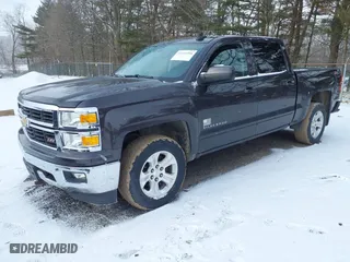 2015 Chevrolet Silverado 1500 LT with VIN 3GCUKREC3FG460485, listed as a IAAI auction lot 41616998 with 128,049 mi miles. Bid and sale history available at carsss.com. Image 2.