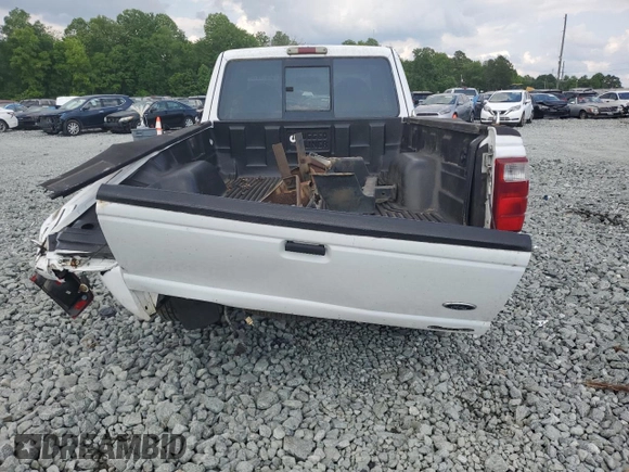 2002 Ford Ranger XL Fleet with VIN 1FTYR44U42TA55243, listed as a Copart auction lot 57310015 with 135,974 mi miles and Salvage title. Bid and sale history available at DreamBid. Image 6.