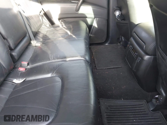 2012 Infiniti QX56 8-passenger with VIN JN8AZ2ND1C9715889, listed as a IAAI auction lot 41440893 with 221,212 mi miles and . Bid and sale history available at DreamBid. Image 8.