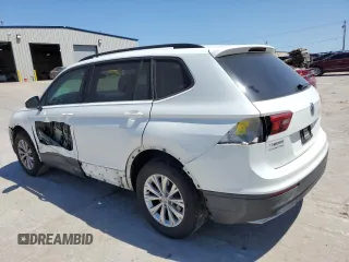 2018 Volkswagen Tiguan S with VIN 3VV0B7AX7JM065958, listed as a Copart auction lot 57598015 with 97,360 mi miles and Salvage title. Bid and sale history available at DreamBid. Image 2.