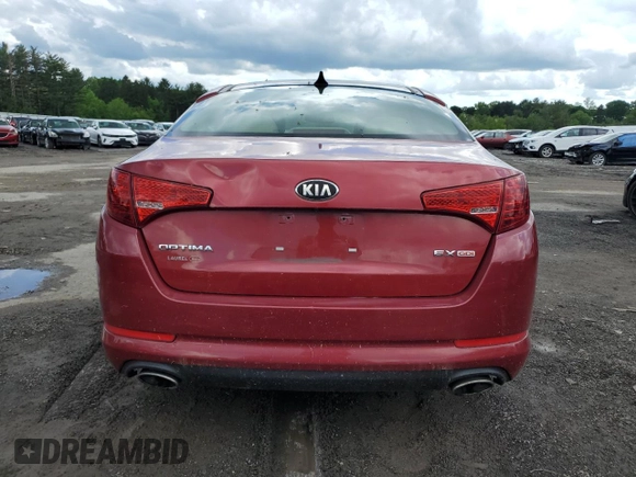 2013 Kia Optima EX z VIN 5XXGN4A72DG245695, wystawiony jako Copart lot #57225035 z przebiegiem 80 005 mil mil oraz Szkoda całkowita • Salvage title. Historia ofert i sprzedaży dostępna na DreamBid. Obrazek 6.