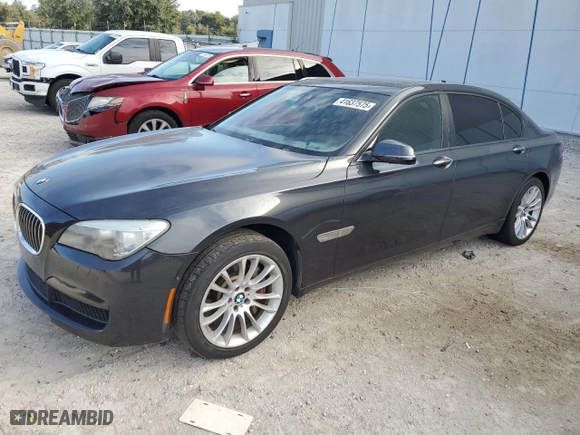 2013 BMW 7 Series 750Li with VIN WBAYE8C52DD132215, listed as a Copart auction lot 41637575 with 122,820 mi miles and Clean Title. Bid and sale history available at carsss.com. Image 1.
