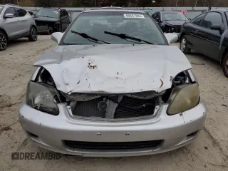 1999 Honda Civic EX with VIN 1HGEJ8144XL022418, listed as a Copart auction lot 80667884 with 147,471 mi miles and Salvage Title. Bid and sale history available at carsss.com. Image 5.