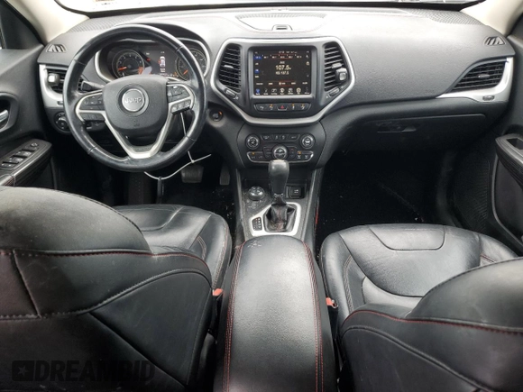 2015 Jeep Cherokee Trailhawk с VIN 1C4PJMBSXFW555223, выставлен на аукционе Copart как лот 62072235 с пробегом 207 240 миль миль и На запчасти • Non repairable. История ставок и продаж доступна на DreamBid. Изображение 8.