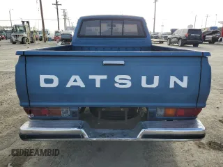 1982 Datsun 720 z VIN JN6SD01SXCW102918, wystawiony jako Copart lot #51125715 z przebiegiem 226 428 mil mil oraz Tytuł czysty. Historia ofert i sprzedaży dostępna na DreamBid. Obrazek 6.