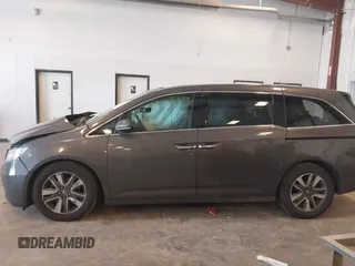 2014 Honda Odyssey Touring with VIN 5FNRL5H99EB105059, listed as a IAAI auction lot 42457672 with 240,581 mi miles and . Bid and sale history available at DreamBid. Image 14.