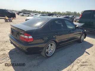 2005 BMW 3 Series 330i with VIN WBAEV53405KM43213, listed as a Copart auction lot 74597414 with 182,881 mi miles and Salvage Title. Bid and sale history available at carsss.com. Image 3.