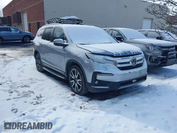 2021 Honda Pilot Elite with VIN 5FNYF6H02MB034165, listed as a IAAI auction lot 41365342 with 48,815 mi miles. Bid and sale history available at carsss.com. Image 1.