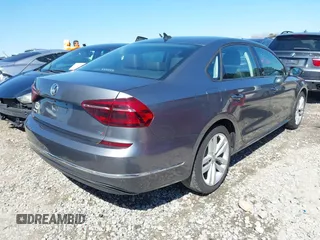 2019 Volkswagen Passat 2.0T Wolfsburg Edition with VIN 1VWLA7A38KC003562, listed as a IAAI auction lot 41704839 with 67,313 mi miles. Bid and sale history available at carsss.com. Image 4.