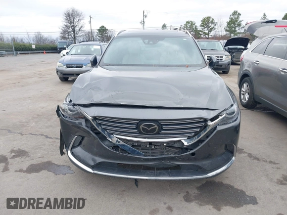 2016 Mazda CX-9 Grand Touring with VIN JM3TCADY4G0111310, listed as a IAAI auction lot 41532851 with 178,907 mi miles and . Bid and sale history available at DreamBid. Image 12.
