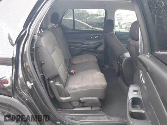 2021 Chevrolet Traverse LS z VIN 1GNERFKW3MJ198757, wystawiony jako IAAI lot #41974050 z przebiegiem 95 097 mil mil oraz . Historia ofert i sprzedaży dostępna na DreamBid. Obrazek 8.
