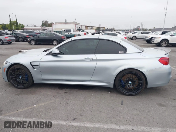 2018 BMW M4 with VIN WBS4Z9C50JED22690, listed as a IAAI auction lot 42439194 with 61,928 mi miles and . Bid and sale history available at DreamBid. Image 14.