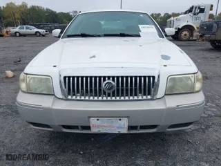 2006 Mercury Grand Marquis GS with VIN 2MEFM74V56X618288, listed as a IAAI auction lot 40838910 with 111,622 mi miles. Bid and sale history available at carsss.com. Image 12.